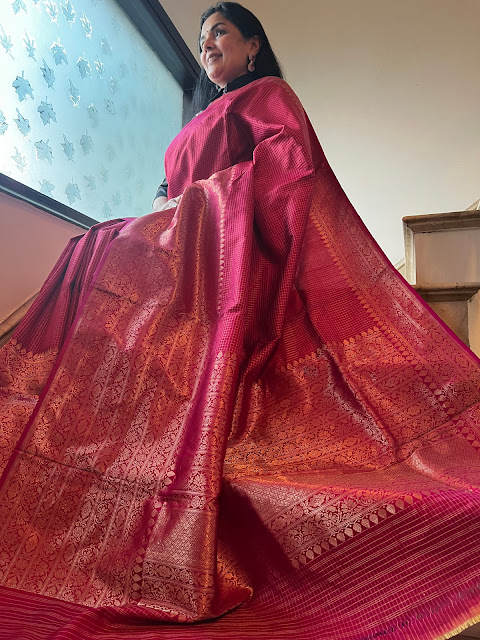 Radiant Elegance: Exploring the Pink Checkered Silk Kanjivaram Saree with a Broad Skirt Border