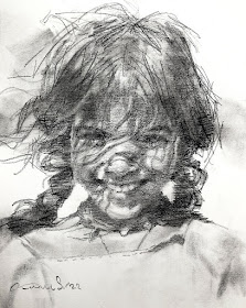 01-Pigtails-and-a-big-smile-Charcoal-Portraits-Kan-Srijira-www-designstack-co