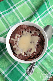 Ready in less than 3 minutes, this Bailey's Nutella Mug Cake is a fudgy, yet fluffy chocolate cake for one that is drizzled with a simple Irish cream glaze.