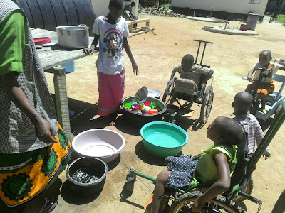 Outreach staff sharing expiriences in disabilities rehabilitation with Siuyu rehabilitatin center at Singida region.