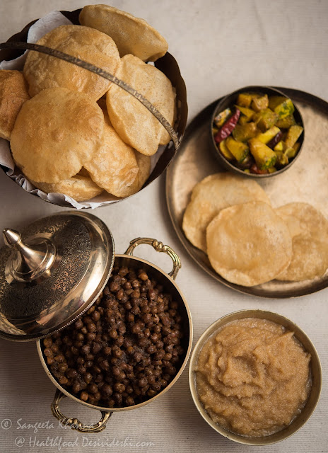 poori chana and halwa meal