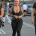 Amber Rose shows off hourglass figure as she steps out with son Sebastian after her shocking bottomless image made headlines  