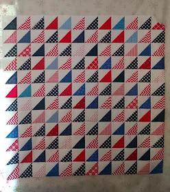 Red, white, and blue half square triangle (HST) quilt