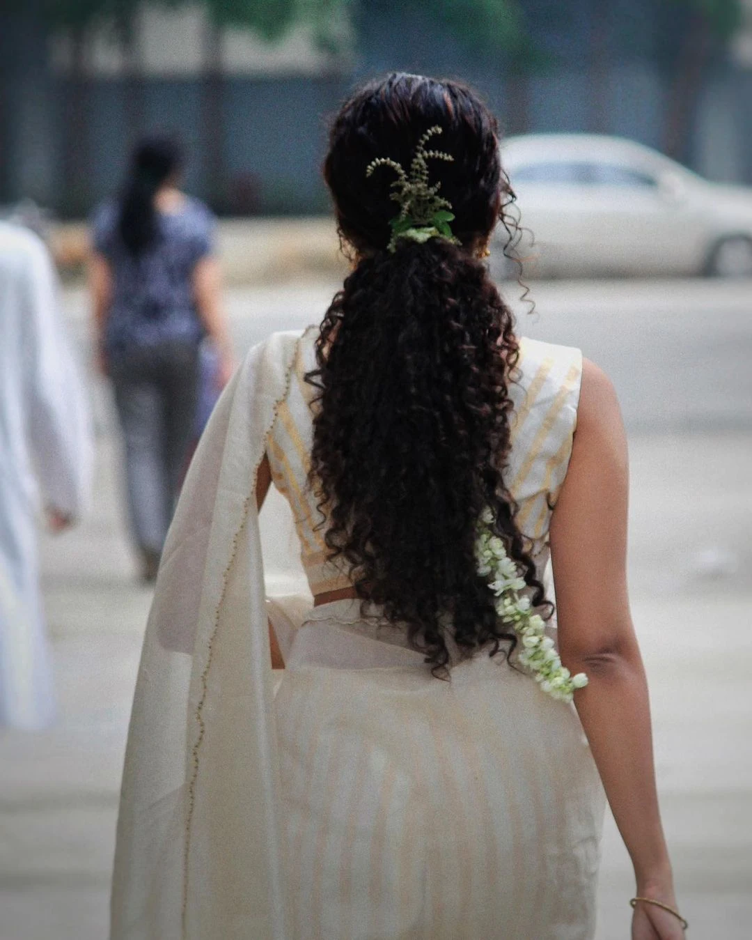 Anupama Parameswaran graceful looking in white Saree