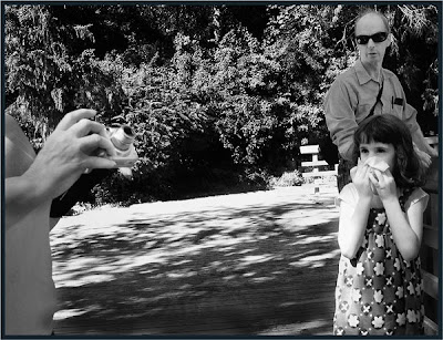 Girl reacting to camera, Toronto portrait photographer Robert Rafton