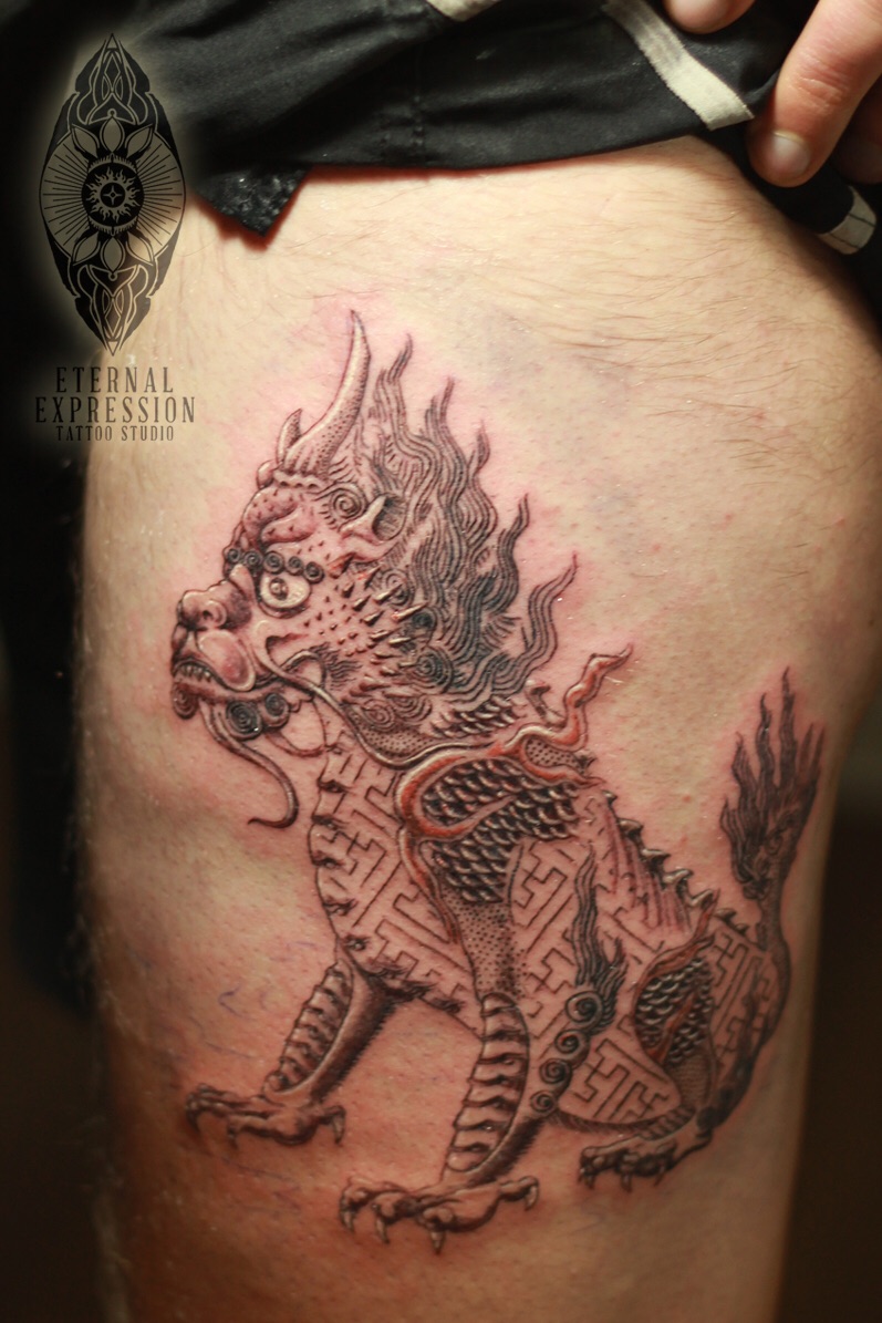 Awesome Snow Lion Tattoo