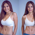 Andrea Torres is showing off her toned abs after Derek Ramsay split