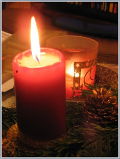 Decorative New Years Eve red Candle in night