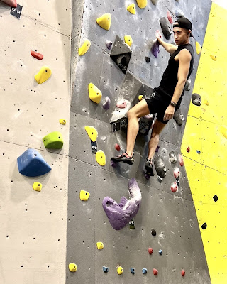 Kalvin Pugh on rock-climbing wall