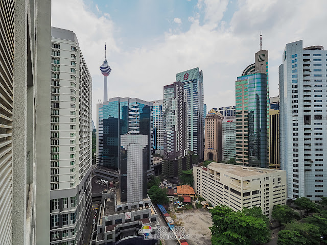 The exact KL City view from my room balcony - Ramada KLCC 17th Floor