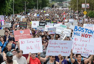 Trump now praises 40,000 protesters for 'speaking out against hate' after first condemning 'anti-police agitators' among huge anti-fascist crowd that took on 'free speech' activists in Boston