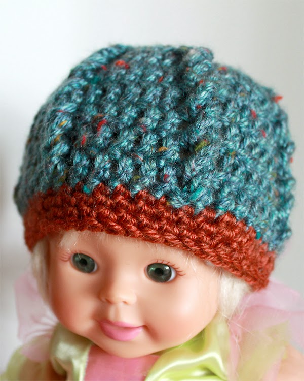 Crochet Cables Baby Beanie | A tiny cap for a brand new baby is a wonderfully satisfying and super quick crochet project. | The Inspired Wren