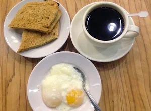 Kaya toast with half-boiled eggs