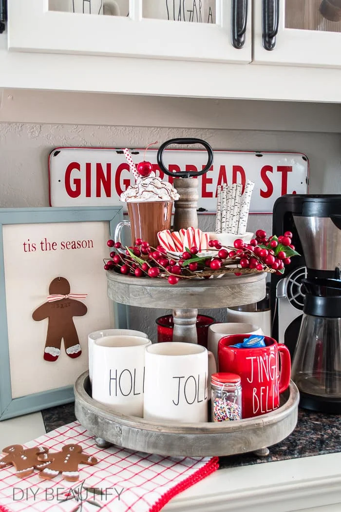 Christmas hot cocoa bar, tiered tray, canvas gingerbread sign, painted clay gingerbread men