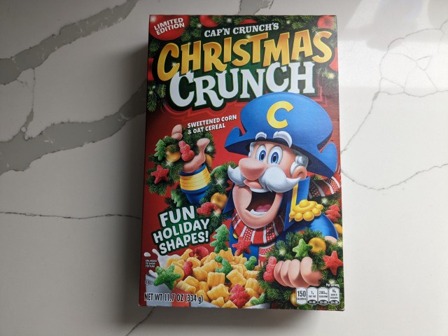 A box of Cap'n Crunch's Christmas Crunch Cereal.