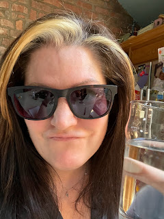 A headshot of me! I'm wearing sunglasses and holding up a pint of water to the camera. Also, just realised that when I said headshot, I meant selfie.