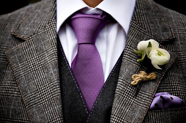And the white ranunculus boutonniere is a perfect compliment