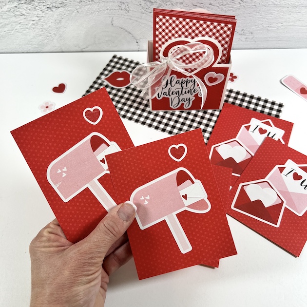 Valentine's Day Memory Matching Game with hearts, flowers, love notes, and mail boxes