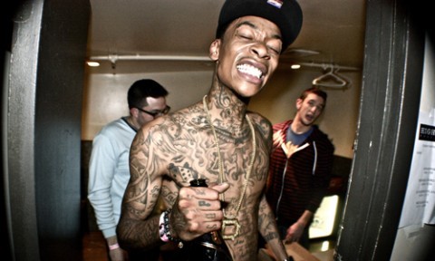 wiz khalifa tattoos on his back. wiz khalifa tattoos on ack.