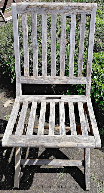 shows old teak wood chair before restoring