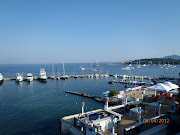 Tara at anchor beside Corfu's Old Town (corfu tara at anchor)