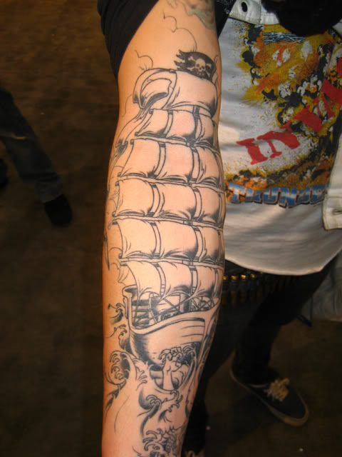 Black and grey pirate sleeve tattoo completed by Kevin Dickinson at guru