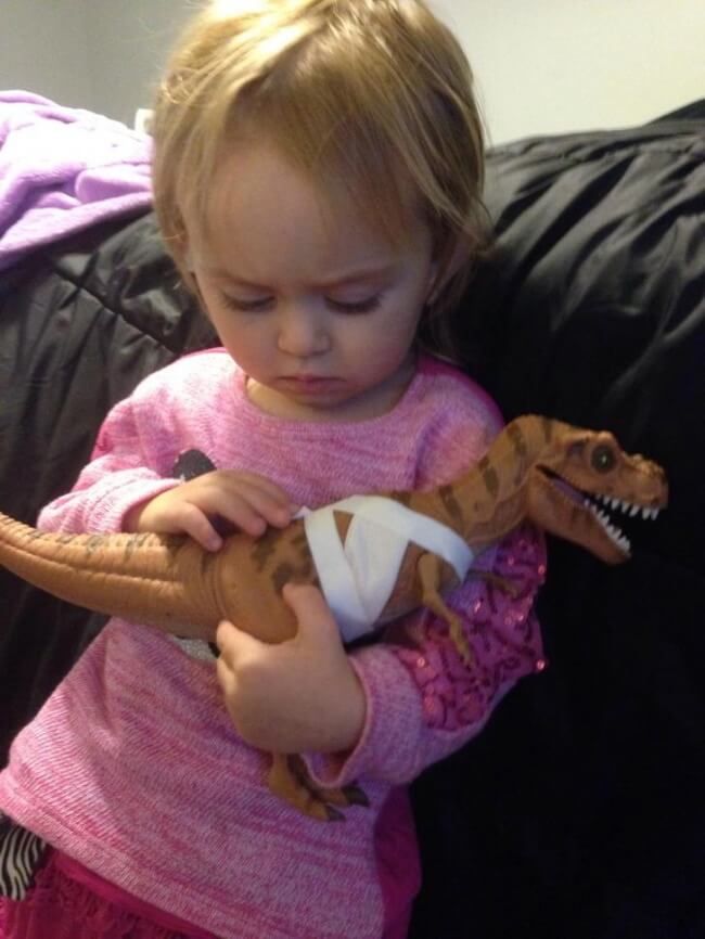 16 Pictures Of Children Restored Our Faith In Humanity - 'Here’s my two-year-old who asked me to help treat this dinosaur’s wounds and is comforting him.'