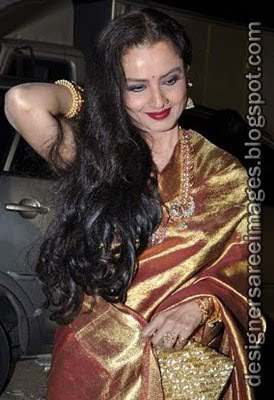 Rekha in golden silk saree