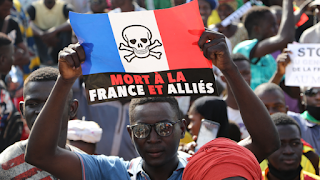 "We want to be free" Learn the main reasons for the decline of France's influence in West Africa Over the past years, West Africa witnessed a wave of angry popular protests, which brought the issue of French influence in that region back to the heart of the protests, as condemnation of Paris' colonial policies in the region turned into a common denominator.  Over the past years, West Africa witnessed a wave of angry popular protests, which brought the issue of French influence in that region back to the heart of the real protests and in the virtual space, where condemnation of Paris' colonial policies in the region turned into a greater common denominator between these protests in different countries.  This socio-political movement and its repercussions threaten to reduce Paris' areas of control in a region that it has always considered an exclusive domain for France's vital interests, using strategic tools to sustain this reality that established its ability to dominate behind the veil of local elites.  Historical domination  To understand the roots of African anger, it is worth going back to the 1960s, when the relationship between France and its former colonies in the brown continent, including West Africa, was founded on the so-called “France Afrique”, in which Paris supports the regimes resulting from negotiating decolonization in exchange for "Loyalty" to Paris, which means that it has the advantage in economic, political and security partnerships.  This afforded Paris a profound influence summed up by French Foreign Minister Louis de Gringaud when he asserted in 1978 that his country "can still, with 500 soldiers, change the course of history" in Africa.  This French strategy included agreements that allow it direct military and security intervention, openly and secretly, to protect the regimes loyal to it when they are threatened, whether from the inside or the outside, and although the Elysee abandoned this policy later to one degree or another, it has entrenched in the conscience of the Africans the organic link between Paris and the corrupt tyrannical functional systems that ruled them.  In addition to this, France imposed its economic hegemony on the region, and Paris still plays a major role in the monetary aspect. The CFA franc, which Paris prints, is considered a currency adopted in a group of West and Central African countries. He deposited in the French Central Bank a cover for this franc, and also gave it a preference in obtaining raw materials at competitive prices, and most dangerously, the countries using it lost control of their monetary policies.  France's tightening of its grip on politics and the economy emptied the independence of its former African colonies of all its meanings, as it turned into the beginning of an era of indirect control through the dominant political, military and economic elites sponsored by the security services in Paris and ensuring the continuity of their rule, in return for the latter obtaining the largest piece of the economy cake until France once had a 30% share of the African market.  West Africa has enormous underground wealth with a more promising environment as a result of the deficiencies of the geological surveys conducted so far, as large reserves of gold, uranium, copper, phosphates, diamonds, bauxite, iron ore, nickel and others were discovered.  Thus, some figures point to amazing paradoxes, as French companies seize uranium from Niger, the fourth producer of this substance in the world , to meet about 75% of France's electric energy needs, while 80% of the Niger population depends on firewood for cooking and lighting, and their country is in horrific poverty. .  The result of these French policies is clearly revealed by the international classifications concerned with development, as the United Nations list of least developed countries for the year 2017 included nine countries of the CFA franc, while the World Bank confirms that almost all countries of the franc zone fall within the group of heavily indebted poor countries.  African spring revolution against france  He always links the repercussions of the French military failure in Operation Barkhane and the outbreak of popular protests against the influence of Paris and its allies, starting with Mali and moving to other West African countries. The transformations in the region on more than one level helped to clarify the picture more.  In this context, the demographic aspect emerges, as young people represented the largest segment of the protesters who roamed the streets of West African capitals and cities, reflecting the high percentage of this age group within the societies of their countries. The French-made “national” aims to provide job opportunities, enable social justice, build the foundations of good governance and create conditions for sustainable development.  While the boats of illegal immigration are the most eloquent expression of the desperation of African youth from the blockage of horizons in their countries, these demonstrations represent an attempt to create a new horizon in which the aspirations of the founding fathers of the African liberation movement from the white colonialists, led by France, are embodied.  In addition to the above, it is worth considering that just as the events of the Arab Spring highlighted the pivotal role of social networks in mobilizing and mobilizing the masses, we find its effects on the communications revolution in the background of African protests, where the battle seems to be raging over the possession and direction of public opinion.  The development of the media and social networking sector, taking advantage of the astonishing growth of mobile penetration near 100% in West Africa according to the 2019 GSMA Intelligence report, has created new dynamics for the dissemination of information, and different spaces used by local influencers to attack France relying on their ability to move Anti-Paris nationalist sentiment.  In the context of the international geopolitical conflict over the region, the Russian role appears to be very effective in the war on social networks, as Wagner groups are active in penetrating African societies, targeting strategic enemies in the region such as France, and promoting the successes of Moscow and its allies, especially in the aspect related to combating terrorism, and reinforcing counter-populist trends. for the West.  Facebook and Twitter have previously announced the discovery of Russian networks that perform this type of activity in Africa through networks run by local contractors or Russian experts, and given Washington's complaint about Moscow's influence on the results of the 2016 presidential elections, we can estimate the situation in countries that do not have sufficient infrastructure to resist This kind of technical breakthrough as West African countries.  Mali and the transformation into a paradigm  Mali represents an important station in the context of the transformations taking place in France in West Africa, where the policies pursued by the leaders of the second coup in Bamako (May 2021) towards Paris were characterized by clarity, sharpness and escalation. hardcore.  Mali witnessed in the summer of 2020, massive protests against President Ibrahim Abu Bakr Keita, an ally of France, that ended with his removal from power in a military coup. Mali, despite launching successive military operations such as Serval and Barkhane, which ended in a paradox that the militants who were isolated in northern Mali at the start of the French intervention expanded inside the country and spread to neighboring countries as well at its end!  This discontent found its translation in unprecedented measures, against the former colonizer, taken by the young coup leaders (again) that were welcomed by wide popular levels in West Africa as an expression of an advanced step for liberation from French colonialism, and a consolidation of the ability of Africans to protect their interests by exploiting geopolitical conflicts The international community and the alliance with new international powers represented by Moscow in this case.  Therefore, it is important to consider Mali, as it has gradually transformed in the conscience of many people in the region into an inspiring model summed up by the protesters in Niamey, the capital of Niger, chanting, “We want to be free like Mali,” while other cities in Niger, Chad and Burkina Faso witnessed the burning of the French flag and attacking Codes and facilities belonging to the French government or companies.  Thus, if the Malian leadership succeeds in its war against the armed movements and in bringing about serious changes in the country, this will put Paris in front of the reality of the possibility of popular rejection of it, in other regions in West Africa, to state policies that undermine what remains of its influence in what was once its back garden.