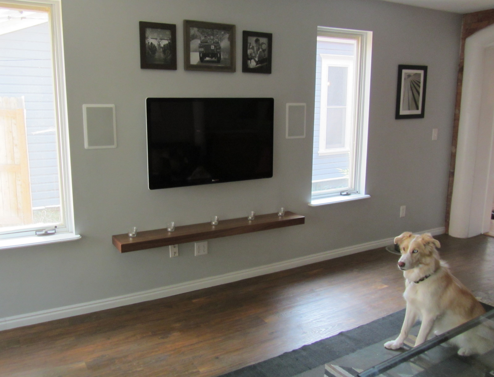 Wall Mounted TV with Floating Shelves