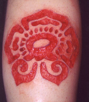 scarification tattoo. Scarification Tattoos