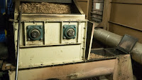 Chipped wood waste is fed into a power plant at a wood mill in rural Oregon. (Credit: Rod Parmenter/Climate Central) Click to Enlarge.