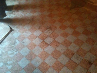 renovation project restoring old floor tiles