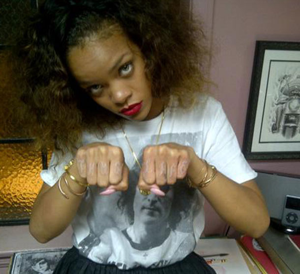 Is Rihanna is officially a thug Riri just came back from her vacation in 