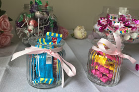 love hearts, lollies and refresher sweets in jars 