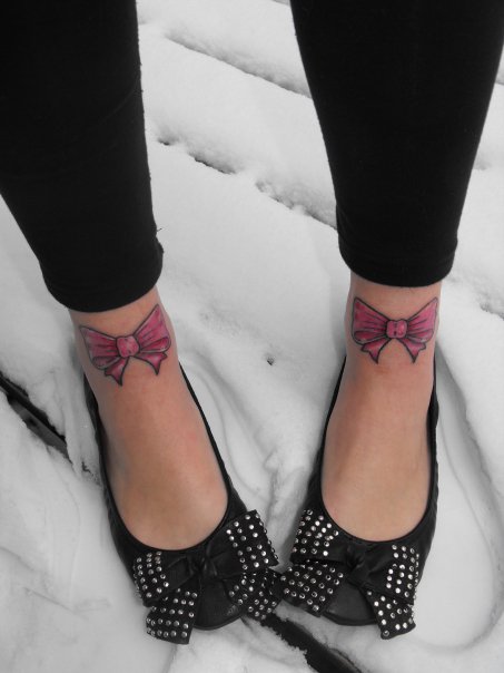 bow tattoos on legs