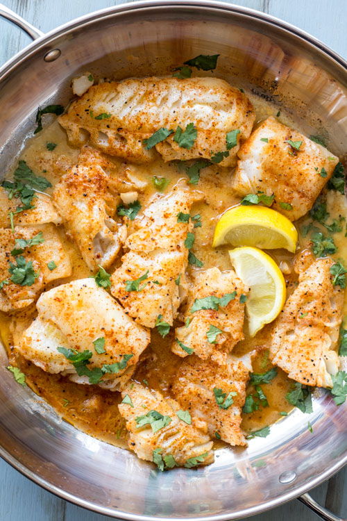  this fish recipe has a wow factor. The seasoned cod cooked in butter and topped with herbs and lemon juice is amazing.