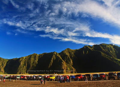 Jeeps and motor cycle park in Bromo's caldera