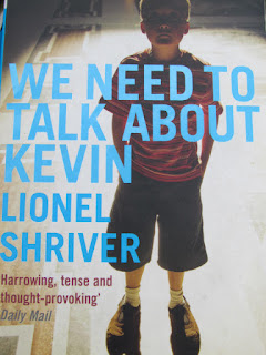 we need to talk about Kevin, Lionel Shriver, review, paperback, bookcover, little boy, creepy, disturbed, school shooting, 