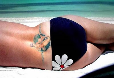 girl with mermaid tattoos designs