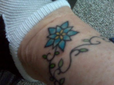 Melissa's mom's tattoo. She previously had the vine on her arm, Melissa's mom's tattoo. She previously had the vine on her arm,