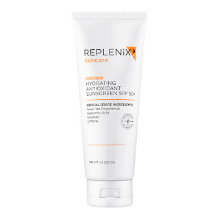 An image of the Replenix Antioxidant Hydrating Sunscreen SPF 50 pump bottle standing upright on a serene, light background. The bottle's label clearly states the SPF 50 protection, hinting at its dual action of shielding the skin from harmful UV rays while providing deep hydration.