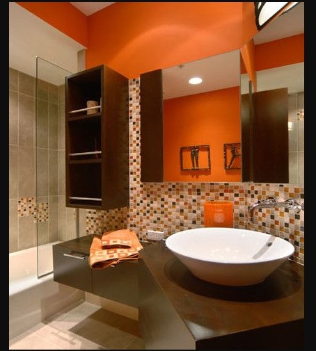 Orange Bathroom Paint Ideas with tuscany color of ceramic and floorign tile cream color of countertop brown cabinet alumunium washbasin mirror frame wall lights mosaic shower cabin floor tilesmall