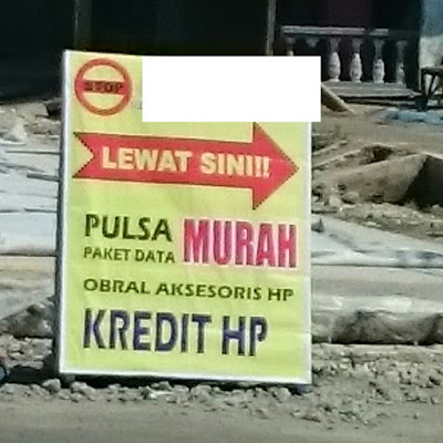 Gambar atau foto cara promosi jualan pulsa dan kuota internet, Penempatan papan promosi jualan pulsa yang baik