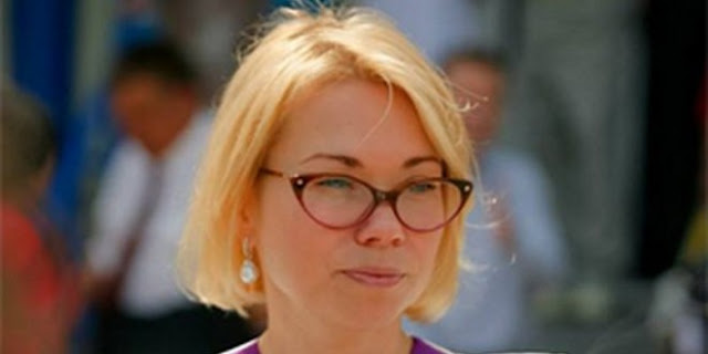 Плотникова