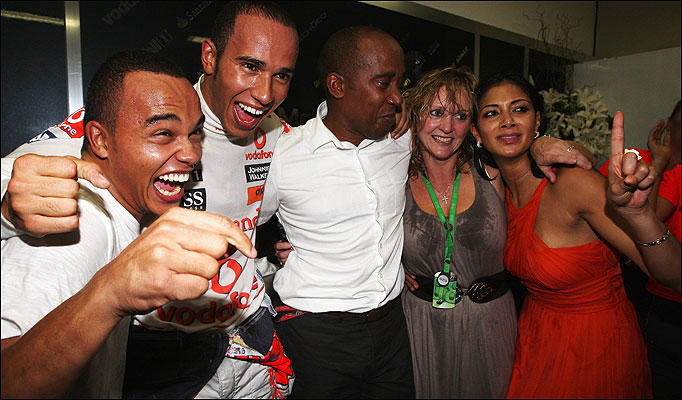 Brother Nic, Lewis Hamilton, Dad Anthony, Stepmom Linda and Pussy Dolls girlfriend Nicole Scherzinger celebrate the F1 Championship