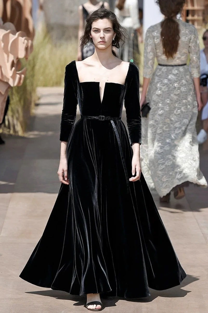 model wearing a black gothic dress on the Christian Dior, Paris Alta Costura fashion show