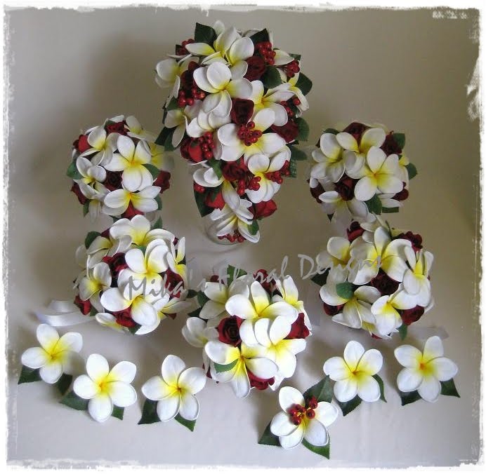 Frangipani and Rose Arrangements