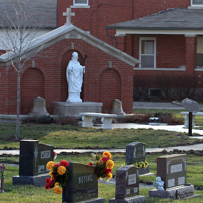 Picture of Saint Patrick Church Memorial with statue of Saint Patrick and Cemetary in the foreground