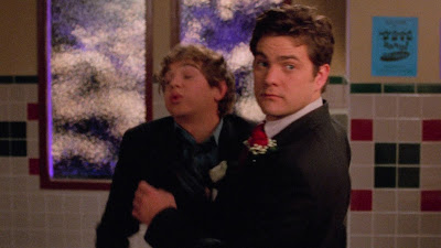 Pacey releasing Patrick from a chokehold